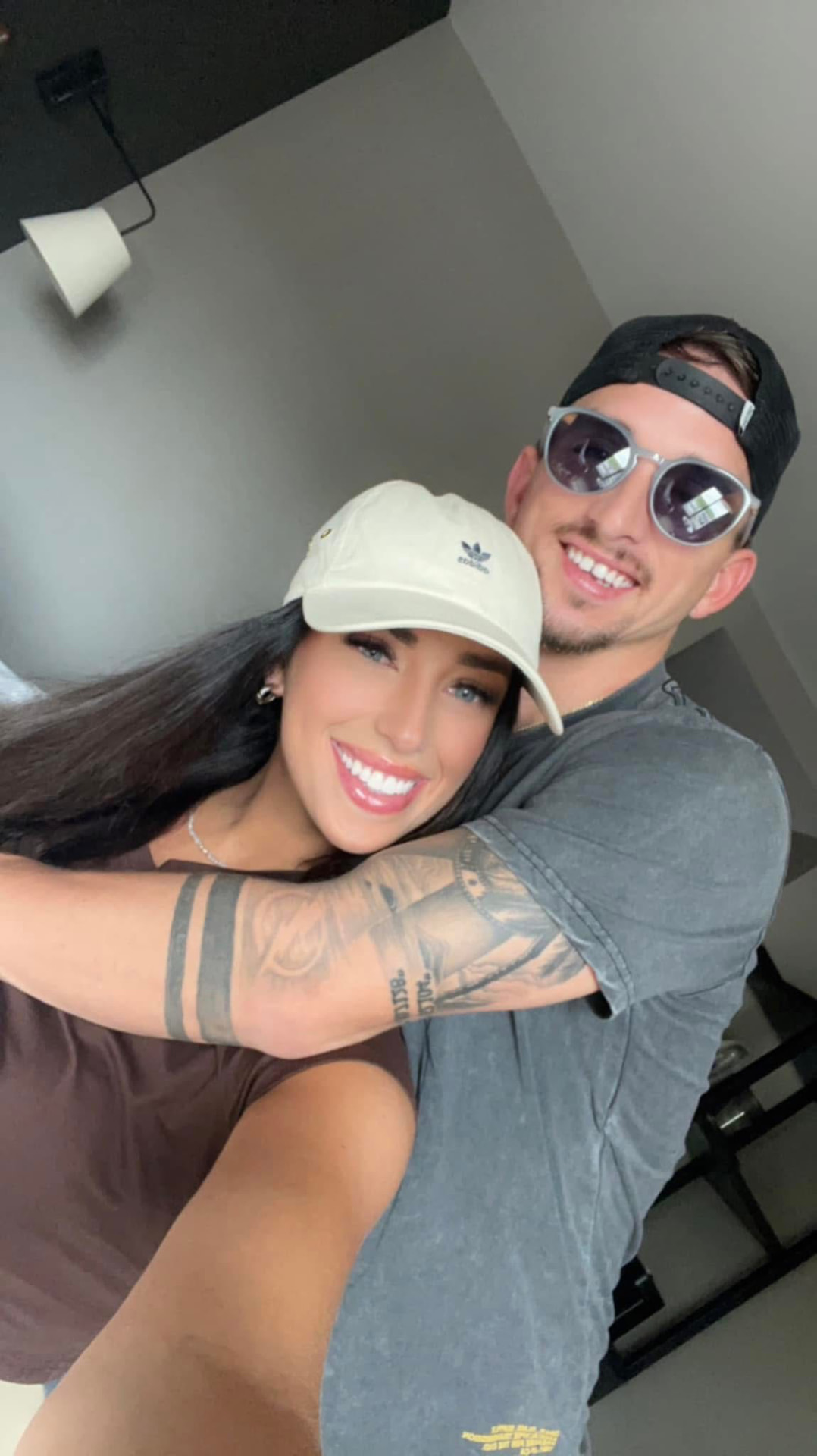Annalyse and Leon smiling together on a long drive